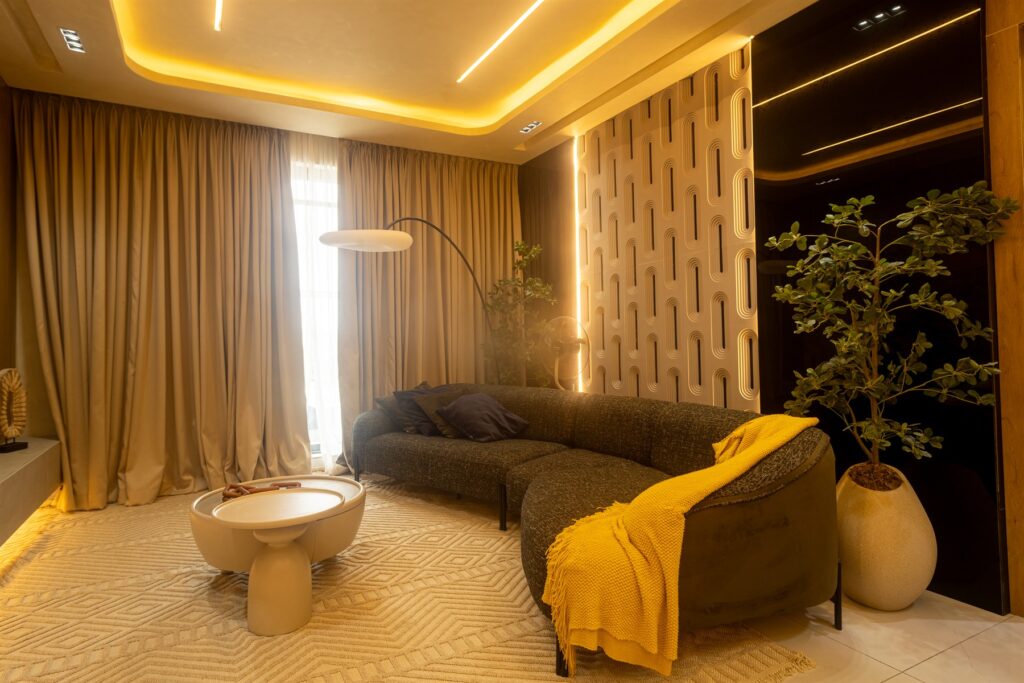Brum Height 9: Furnished living room with a sectional sofa and round coffee table